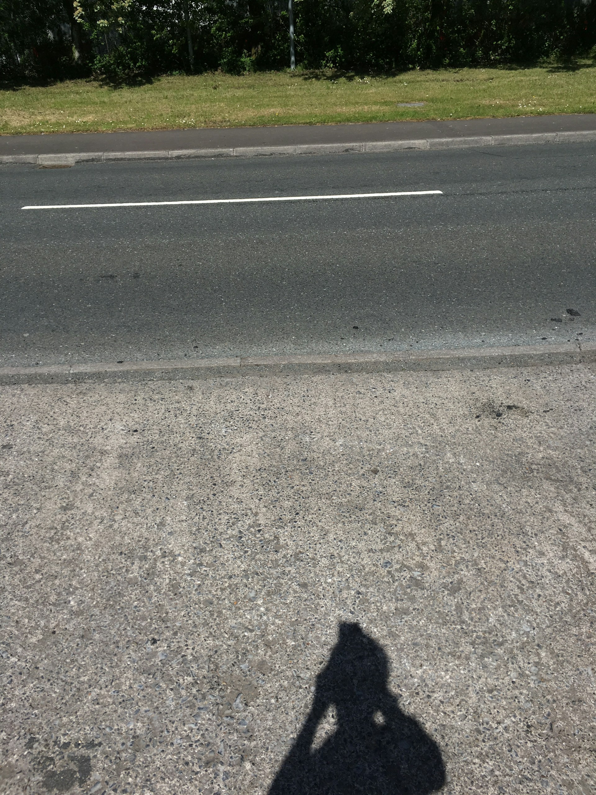woman wearing yellow long-sleeved dress under white clouds and blue sky during daytime