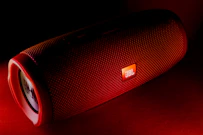red JBL portable speaker