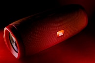 red JBL portable speaker