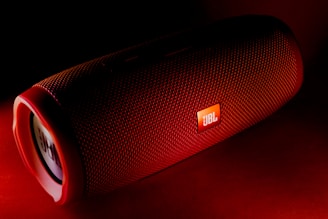 red JBL portable speaker
