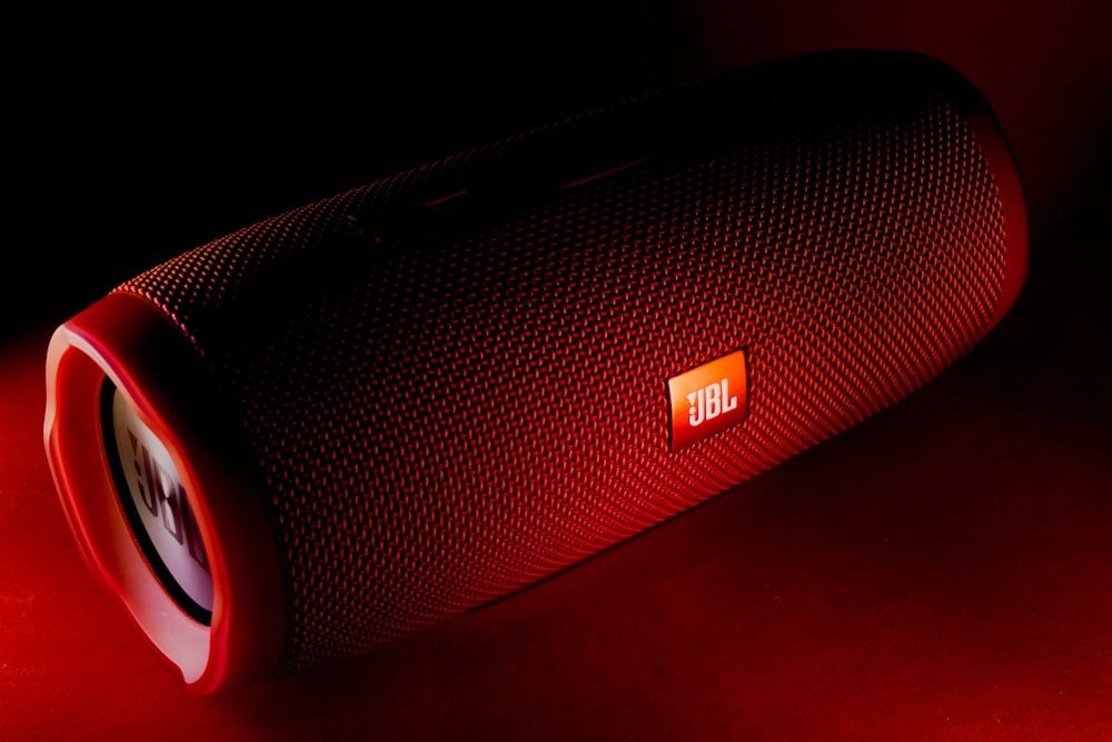 red JBL portable speaker