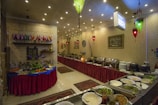 A cozy dining area featuring a buffet setup with a variety of dishes.