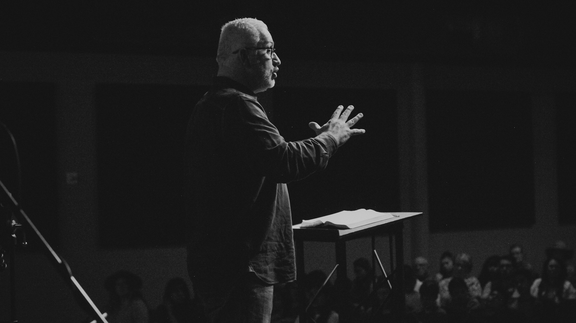 man speaking to a crowd