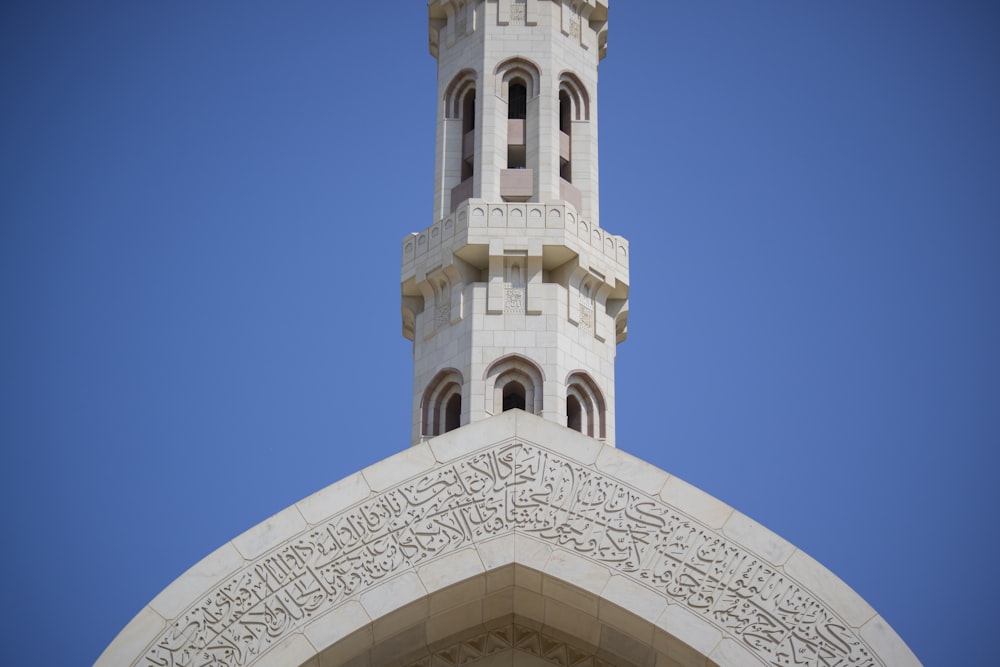 white concrete building under blue sky