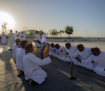 man kneeling on ground