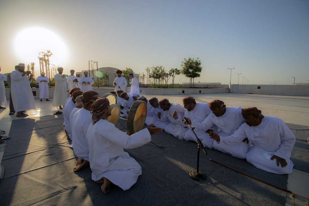 man kneeling on ground