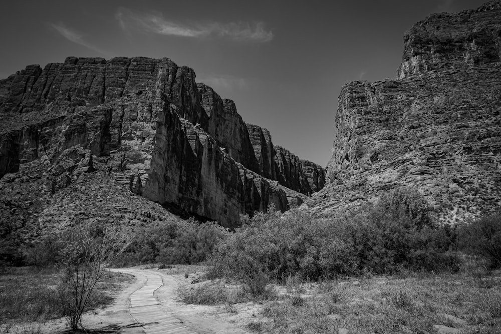 grayscale photo of mountain during daytime