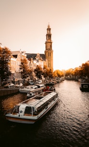 white and brown boat