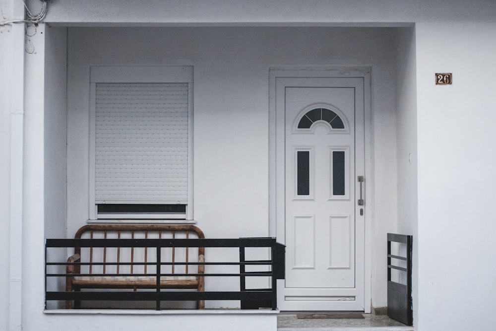 white wooden 4-panel door