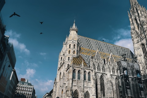 low-angle photo of white cathedral during daytime