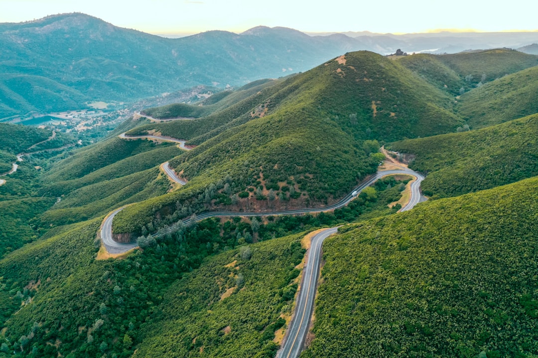 aerial photography of road near mountain range during daytime