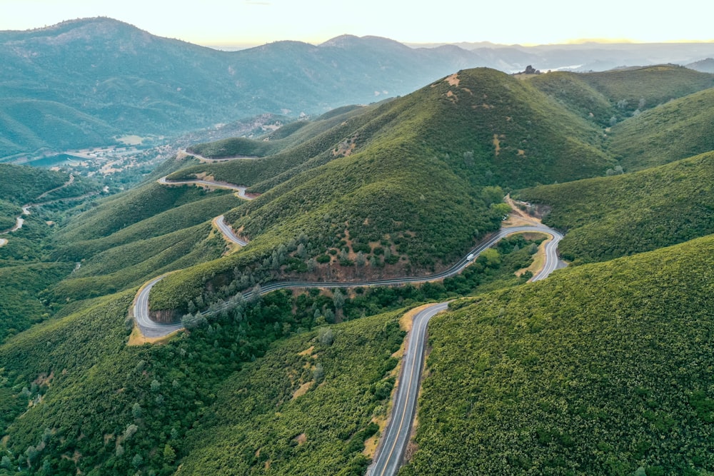 aerial photography of road near mountain range during daytime