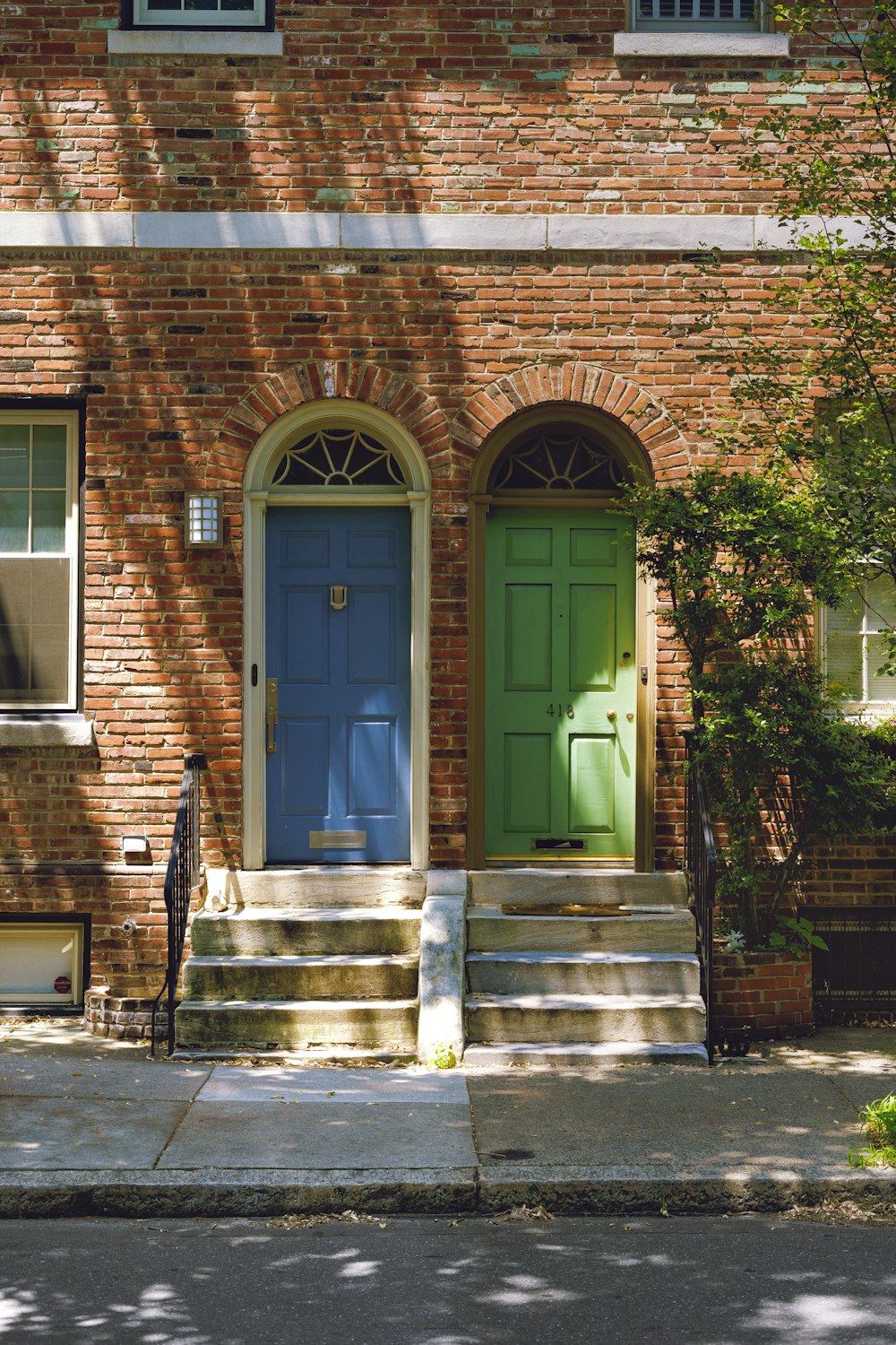 blue and green wooden doors