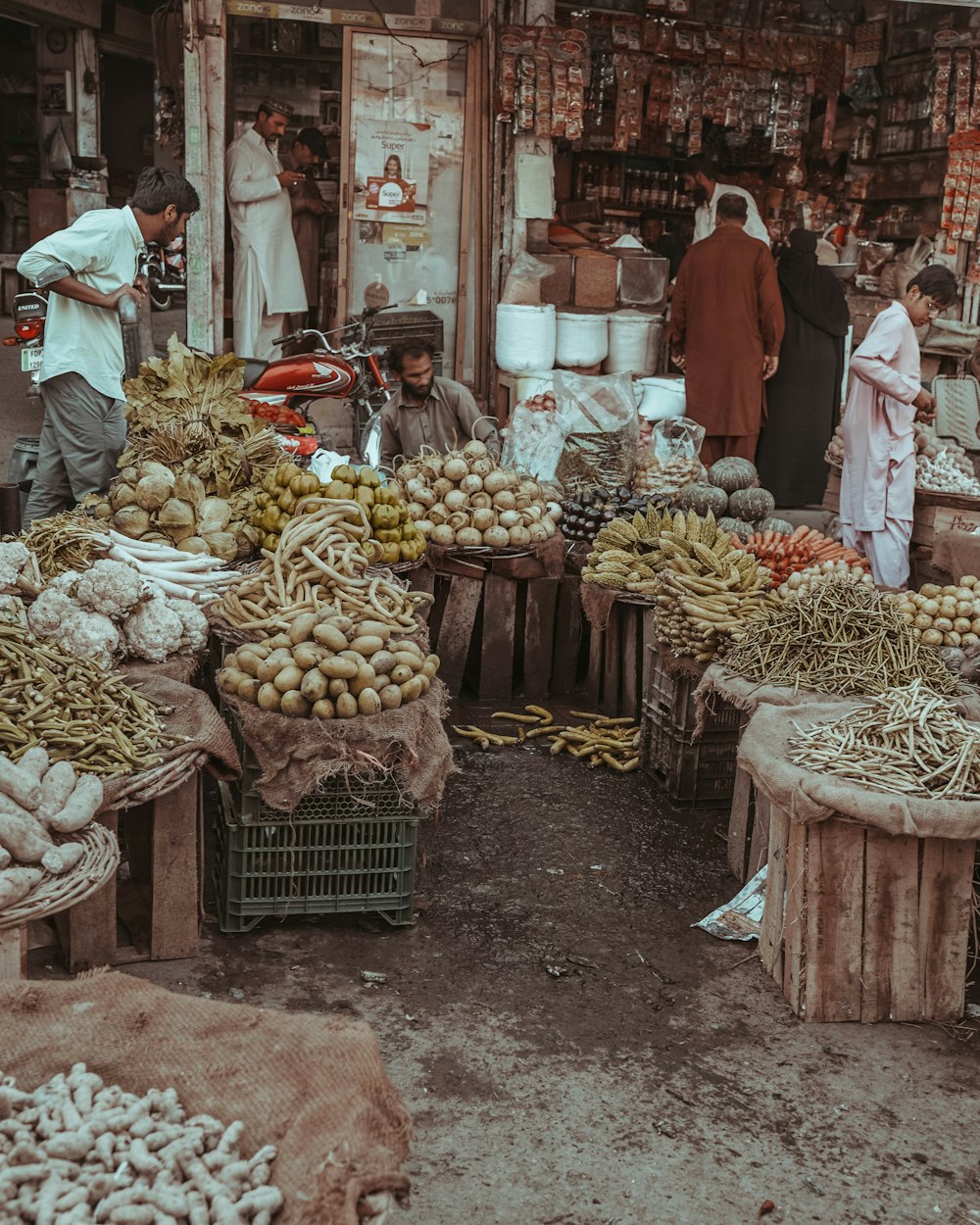 man and woman standing near store during daytime