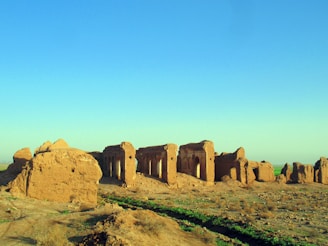Historic ruins blending into the arid landscape, telling stories of the past.
