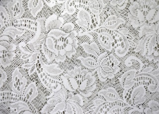 white floral textile