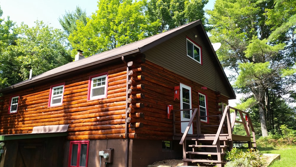 brown wooden house surrounded by house