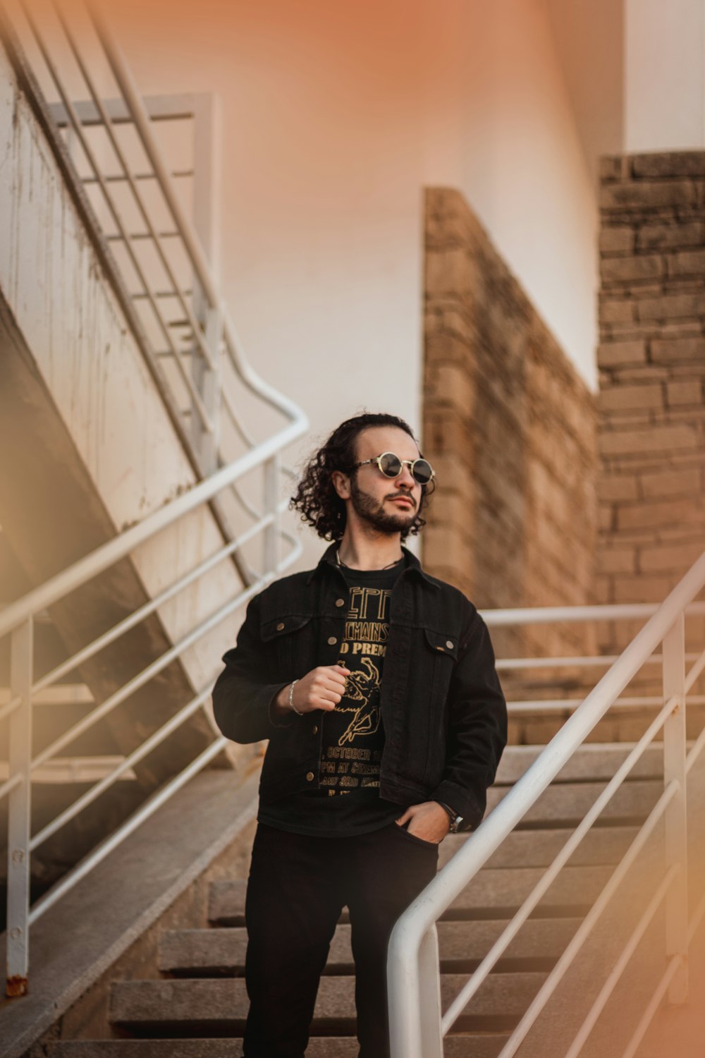 man standing on stairs