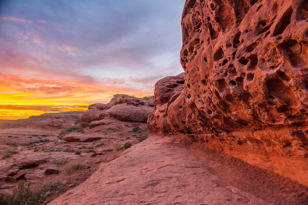 brown rock formation during sunset