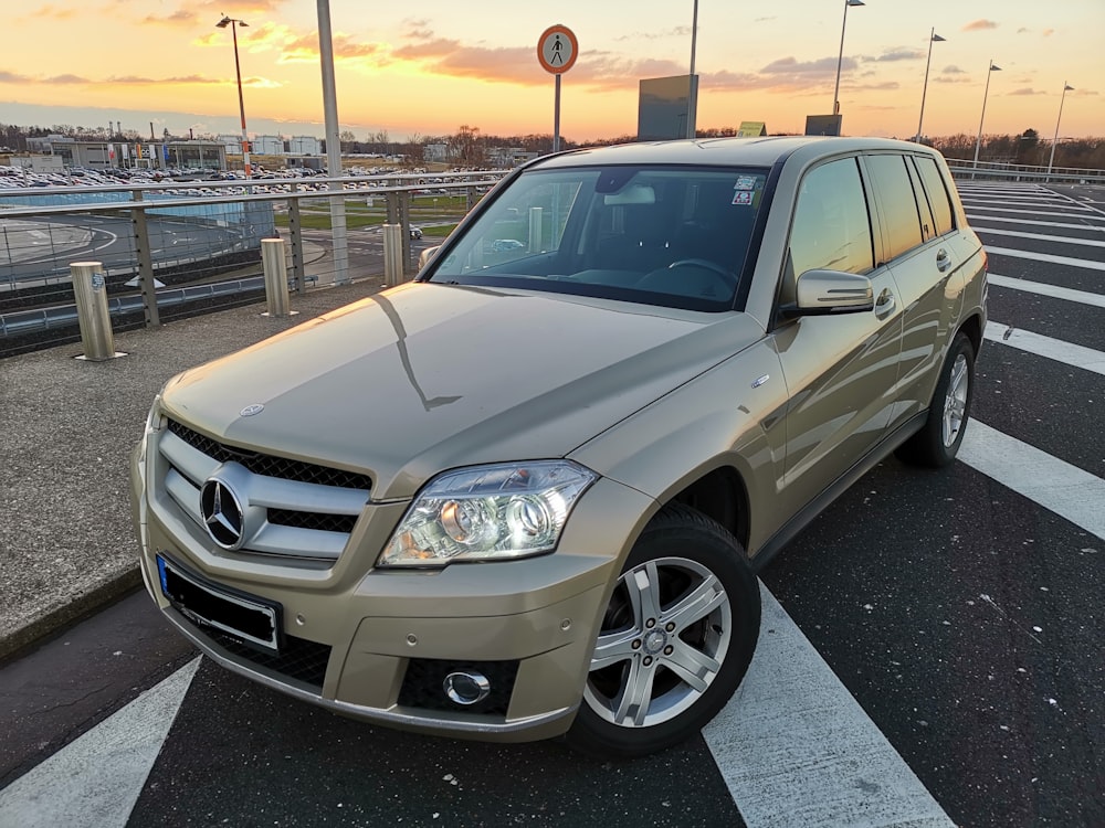 gold Mercedes-Benz SUV