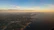 A serene aerial shot of a coastal Portuguese landscape at sunset, highlighting natural beauty and calm.
