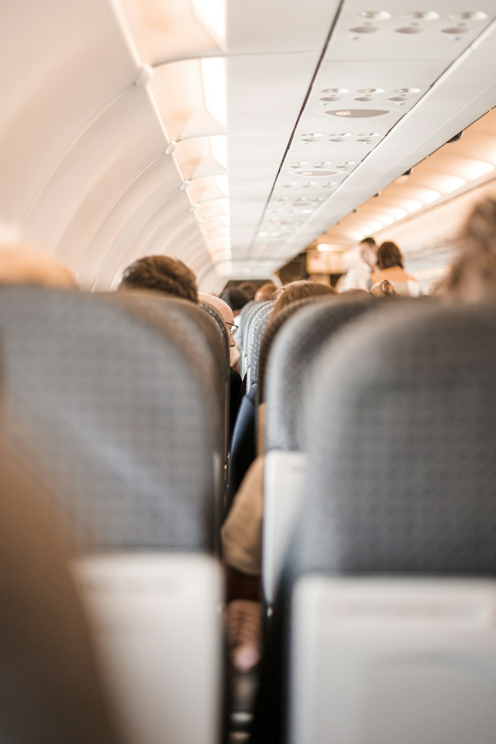 people on plane seats