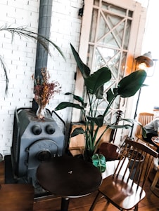 Cozy family restaurant interior with traditional clay pots cooking on the stove