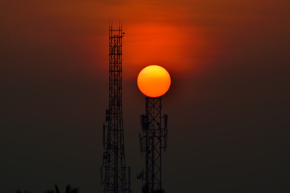 transmission tower during sunset
