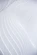 a close up of a white wall with wavy lines