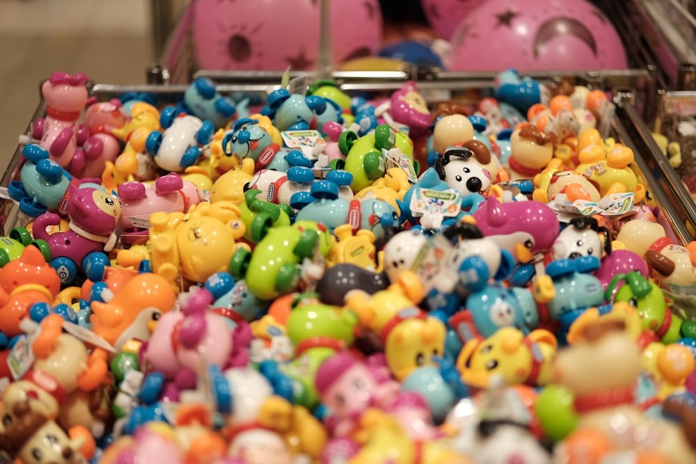selective focus photography of animal toys