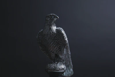 Elegant Falconix edition piece displayed on a polished surface with blue lagoon hues.