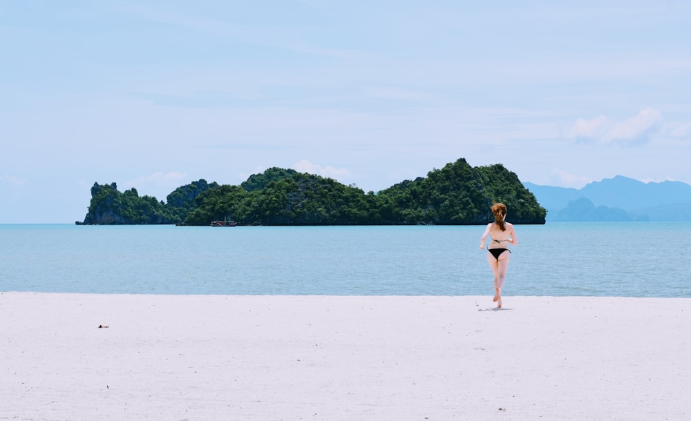 woman standing on beach