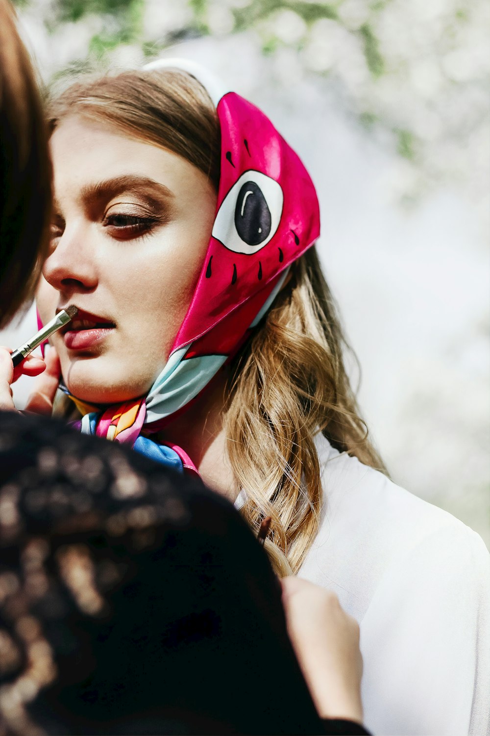 woman wearing red and white bandana