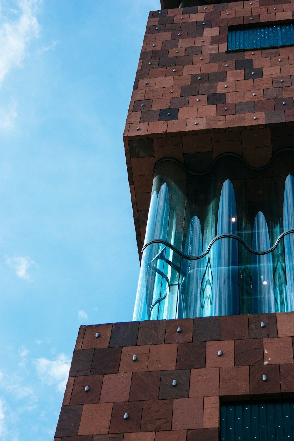 brown brick and clear glass building