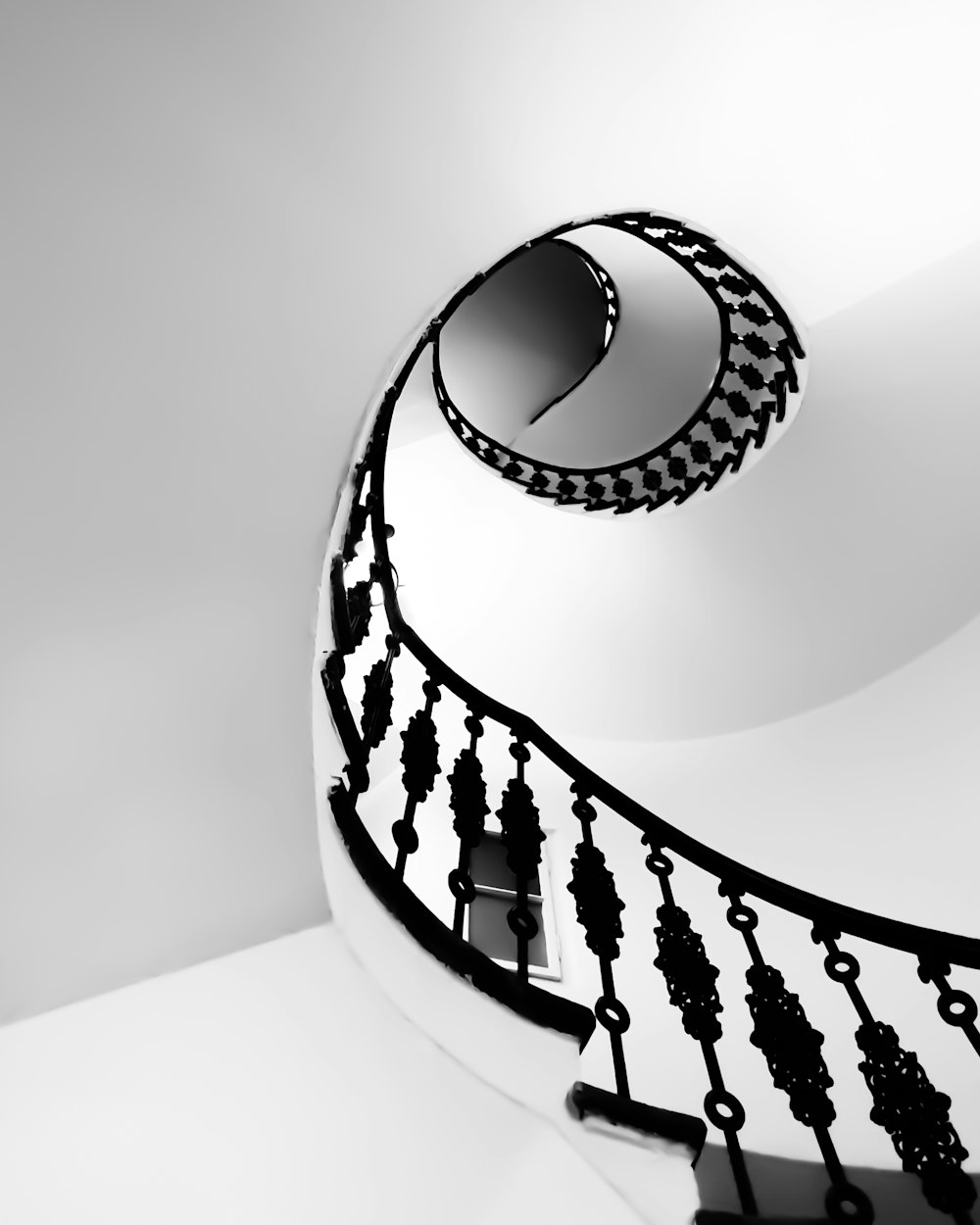 structural photography of spiral house stairs