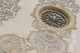Stucco detail around a window frame highlighting craftsmanship and precision.