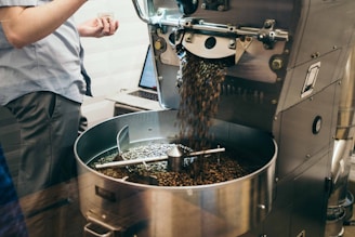 person using gray and black metal machine
