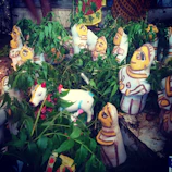 Idolitos arranged in a circle, showcasing diverse designs and vibrant colors.