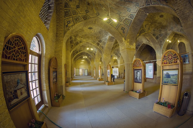 A beautifully designed interior hallway showcasing elegant lighting and textured walls.