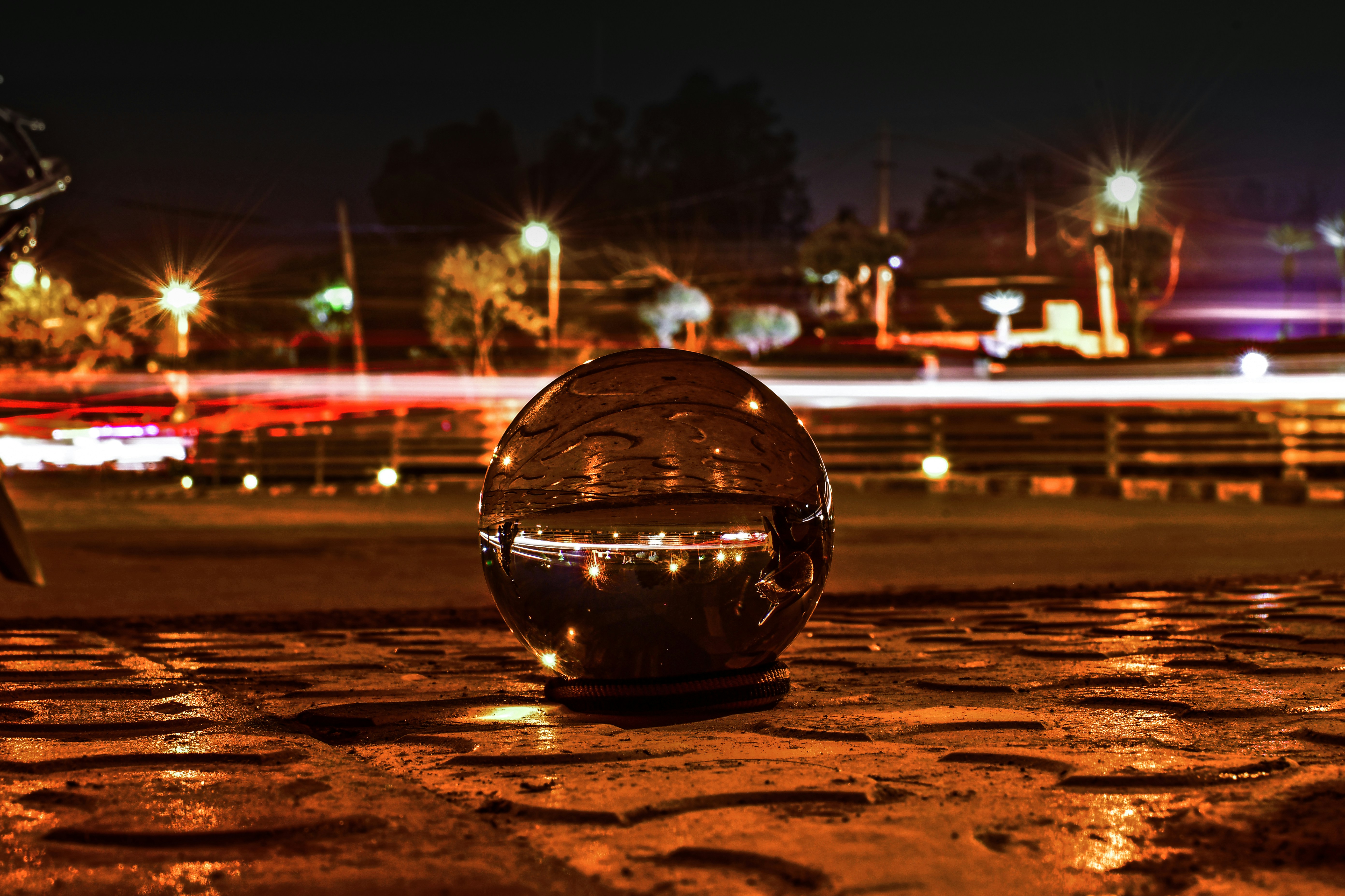 clear glass ball photo across lights