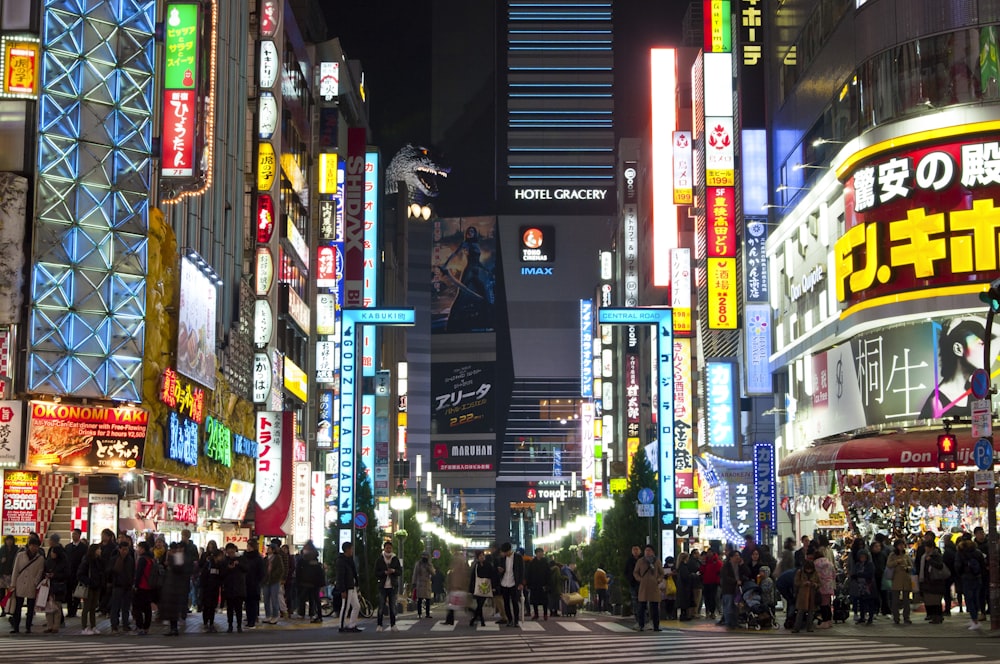 crowded pedestrian lane in urban area at night