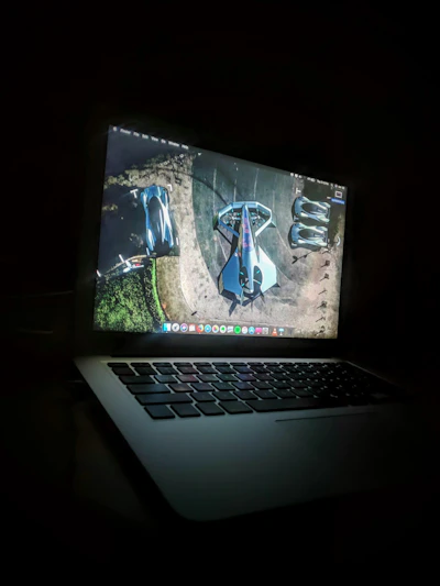 gray laptop computer turned on