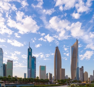 concrete high rise buildings in urban area during daytime