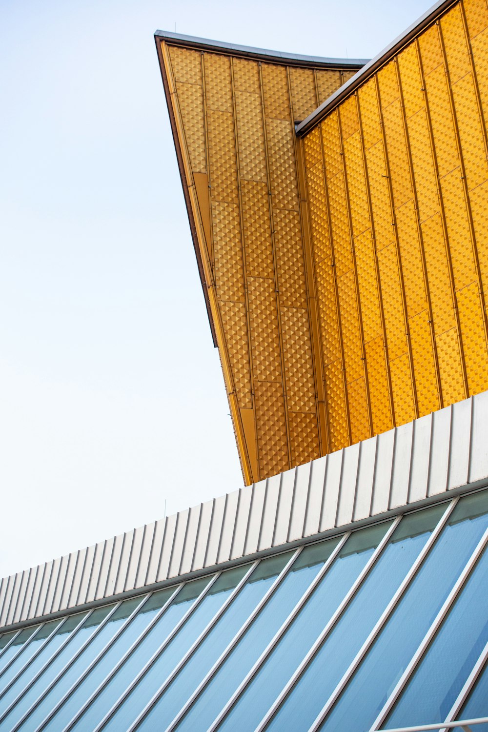 white and orange concrete building during daytime