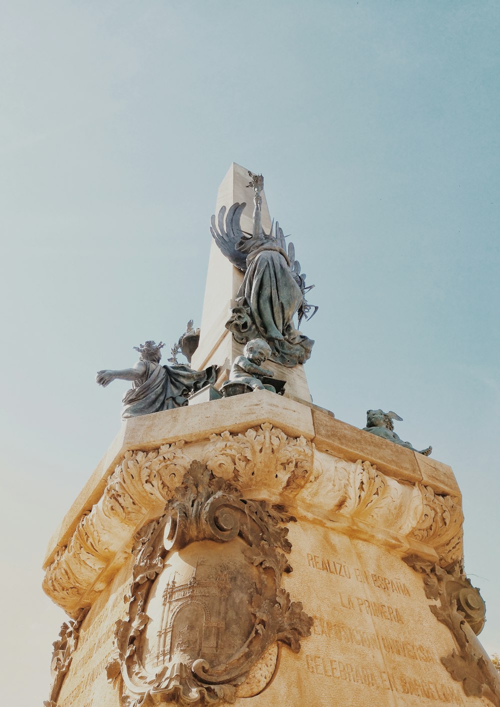 white and grey concrete statue