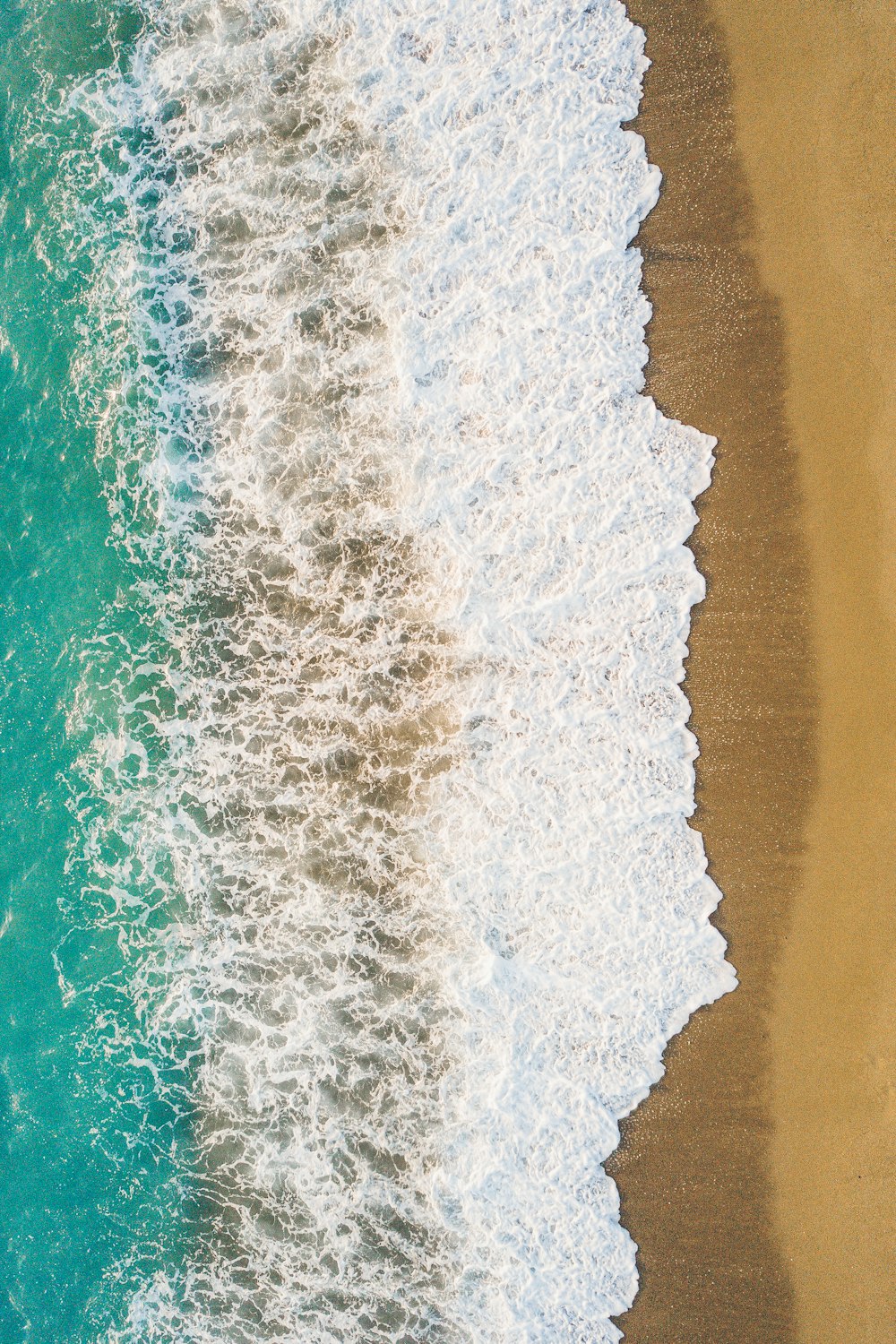 aerial view of sea wave during daytime