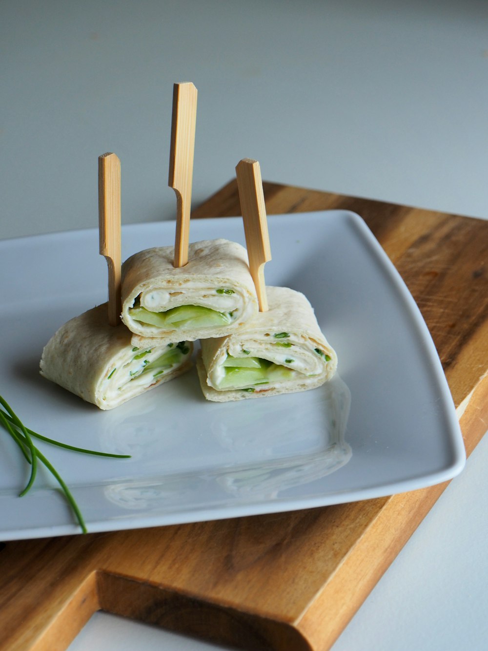 square white plate with foods