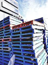 blue and red wooden pallets during daytime