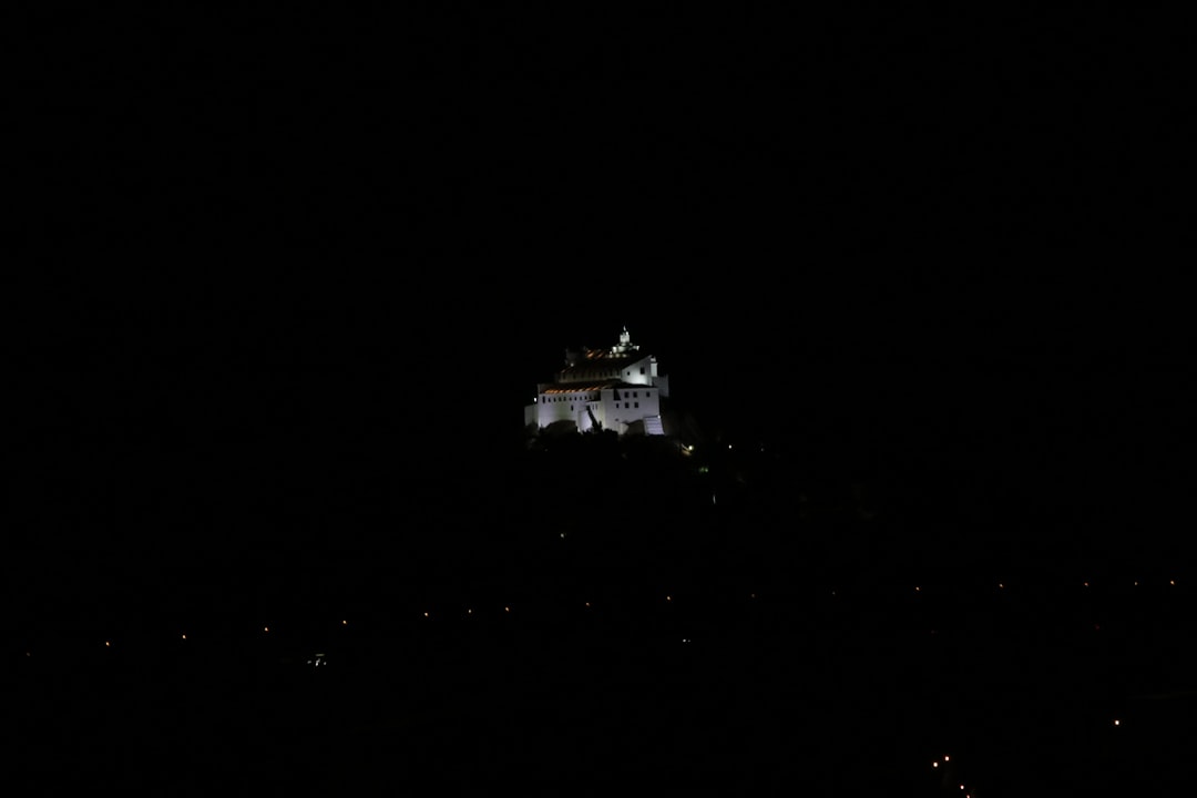 white concrete building at night