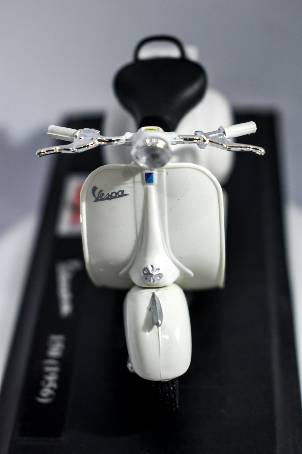 white Vespa scooter scale model